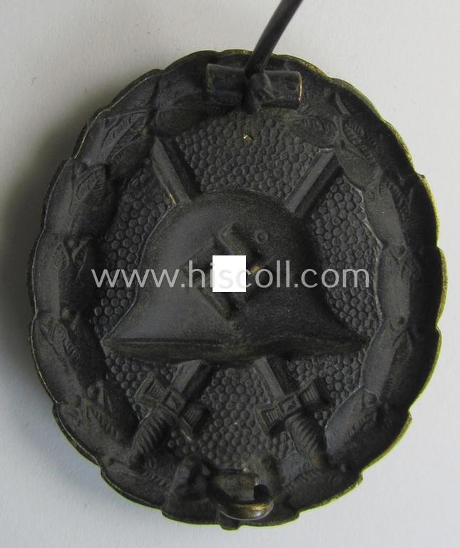 Attractive, early-pattern, black-class wound-badge (ie.: 'Verwundeten Abzeichen in Schwarz') being a detailed so-called: 'Spanish Civil-War'-version that comes in a moderately used- and/or worn, condition