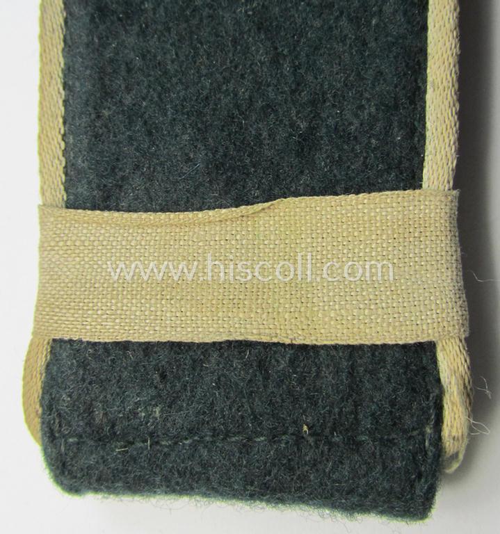 Attactive - albeit single! - WH (Heeres), early-war-period (ie. 'M36'- ie.: 'M40'-model- ie. rounded-style-) EM-type shoulderstrap (showing a regimental-indicator 'slip-on' attached!) as was intended for a: 'Soldat der Infanterie-Truppen'