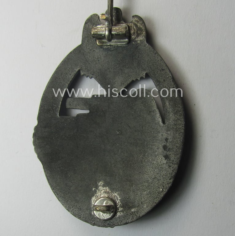 'Panzerkampfabzeichen in Silber' (or: silver-class panzer-assault badge or PAB) being a typical non-maker-marked- and/or zinc- (ie. 'Feinzink'-) based specimen of the so-called: 'scooped flatback'-pattern