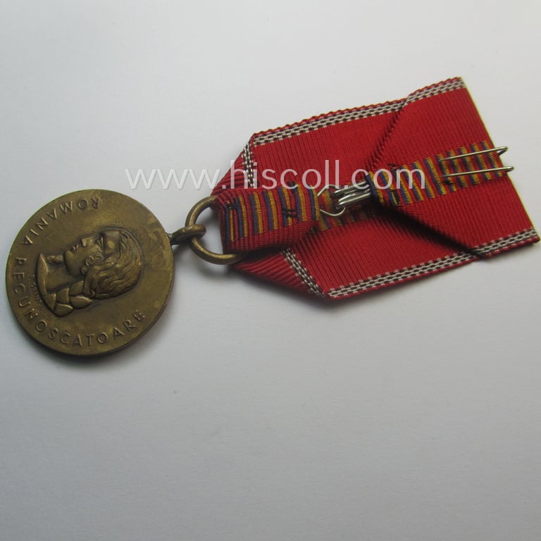 Romanian, WWII-period medal: 'Kreuzzug gegen den Kommunismus' (or in Romanian language: 'Medalia - Crusiada Impotriva Communismului') that comes mounted onto its original (and neatly pre-confectioned!) ribbon as issued