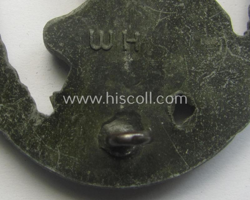 Later-war period- and/or: zinc- (ie. 'Feinzink'-) based- example of a maker- (ie. 'WH'-) marked, WH (Luftwaffe) 'Flakkampfabzeichen' (or: airforce anti-aircraft badge), as was produced by the desirable: 'Wilhelm Hobacher'-company