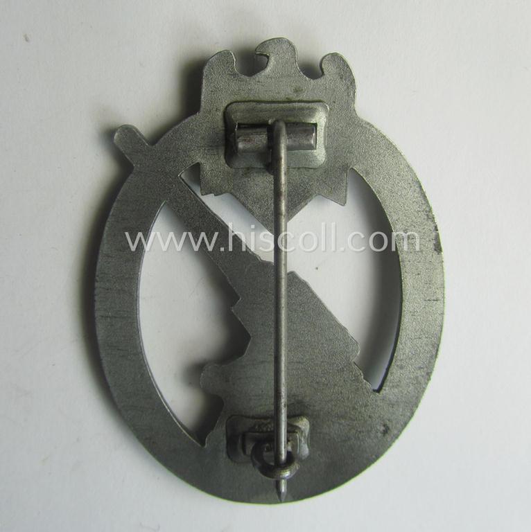 'Heeres-Flakkampf-Abzeichen' being a non-maker-marked- and/or zinc- (ie. 'Feinzink'-) based specimen of the so-called: 'pillow-crimped'-pattern (as was produced by a to date still unidentified maker)