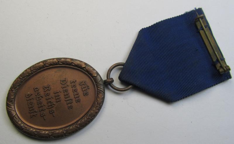 Attractive example of a: RAD (ie. 'Reichsarbeitsdienst') so-called: 'Dienstauszeichnung 4. Stufe für Männer' as was intended for 4 years loyal-service and that comes mounted onto its period piece of ribbon (ie. 'Bandabschnitt')