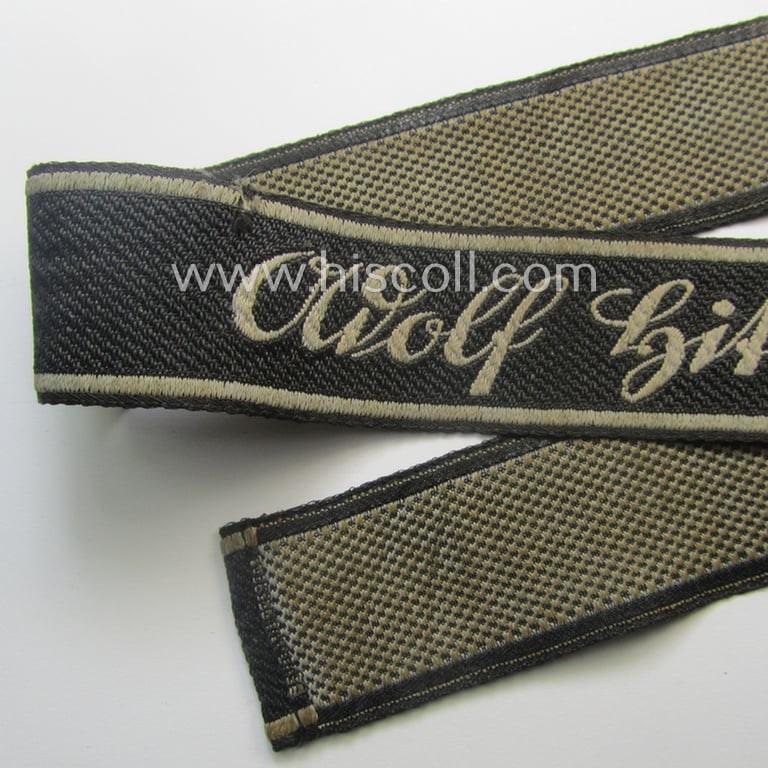 Superb - and just minimally worn and/or tunic-removed! - Waffen-SS 1943/44-pattern cuff-title (ie. 'Ärmelstreifen') in typical 'BeVo'-weave-pattern as was intended for a member within the: 1. SS-Panzer-Division "Leibstandarte-SS Adolf Hitler"