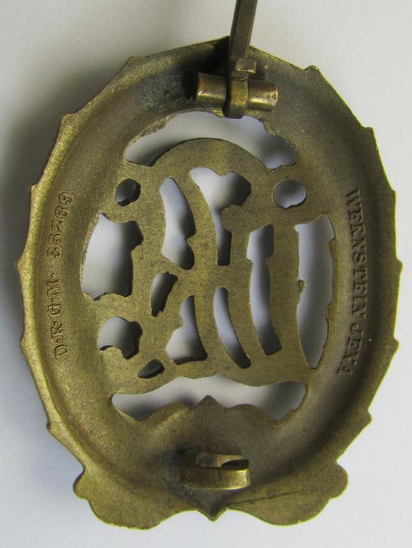 Attractive - and I deem just moderately worn- ie. used! - 'Reichssportabzeichen DRL in Bronze' (or: DRL sports'-badge in bronze) being an example that is nicely maker- (ie. 'Wernstein-) marked on its back