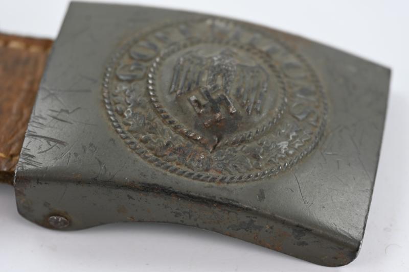 German WH Beltbuckle with Schrapnel damage and Tab 'E.Schneider'