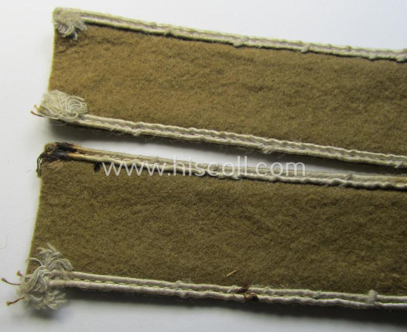 Attractive, WH (LW o. Heeres) cuff-title (ie. 'Ärmelstreifen') entitled: 'Afrika' (being a full-length example that comes in an issued-, used and/or carefully tunic-removed, condition)