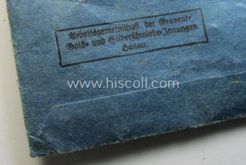 Neat, 'Eisernes Kreuz II. Klasse' being a non-maker-marked example that comes together with its ribbon (ie. 'Bandabschnitt') and 'Zellstoff'-based pouch as was produced by the maker: 'AG der Graveur-, Gold- u. Silberschmiede-Innungen'