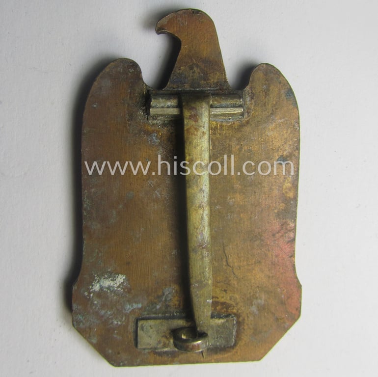 Period-altered, N.S.D.A.P.-related 'tinnie' (ie. 'Tagungs- o. Veranstaltungsabzeichen'-) being a non-maker-marked, 'solid-back'-pattern and/or golden-bronze-toned example showing the text: 'N.S.D.A.P. Reichsparteitag - Nürnberg 1933'