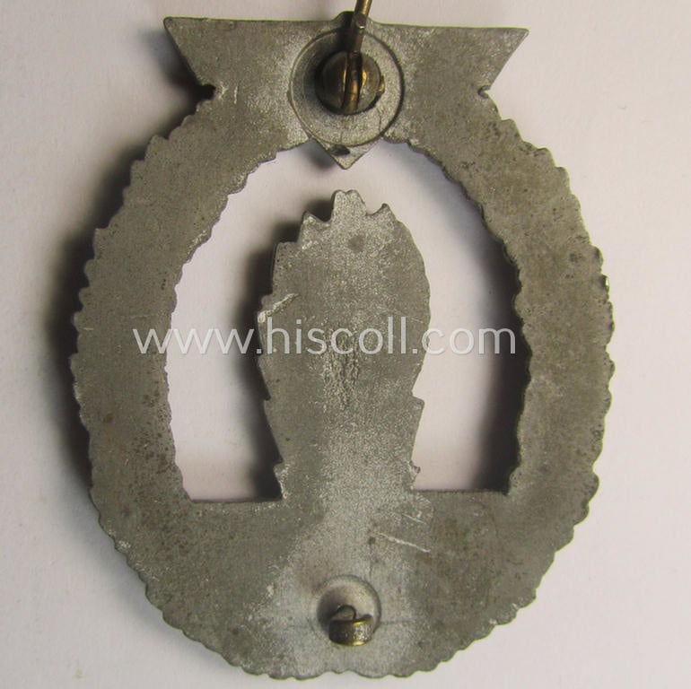 WH (KM) 'Kriegsabzeichen für Minensuch-, U-Boot-Jagd und Sicherungs-Verbände' being a typical non-maker-marked, 'Feinzink'-based example as was (I deem) produced by the: 'Adolf Scholze'-company