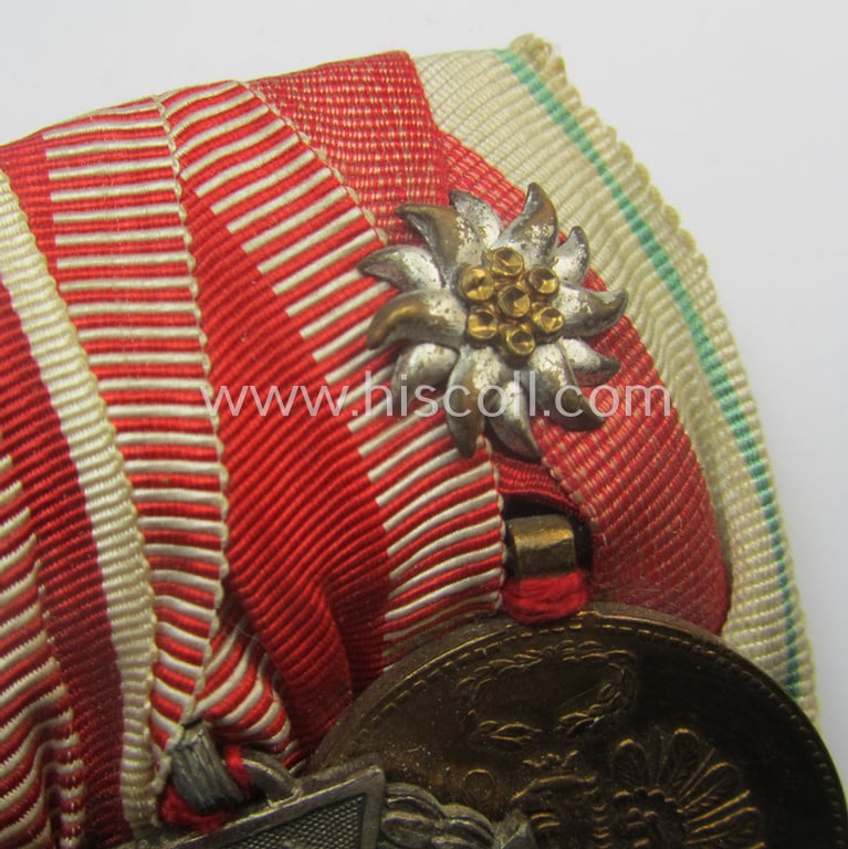 Superb, 8-pieced WWI- (ie. TR-) related medal-bar (ie. 'Ordenspange') depicting an: 'EKII.Kl., an: 'FKK 1914-18 mit S.', an: 'EZ für D. Vp 3. Stf.', a: 'TD-Ez. der 2. Kl.', a: 'Deu. Olympia-E.medaille 1936' and three Austrian WWI-period comm. medals