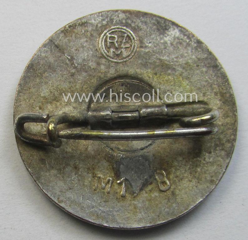'N.S.D.A.P. - Parteiabzeichen' showing the makers'-designation: 'RzM' and/or: 'M1/8'