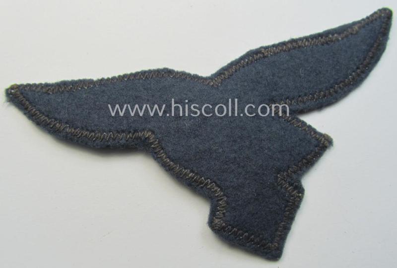 Superb - and simply never used! - WH (LW) officers'- (ie. evt. NCO-) type breasteagle (ie. 'Brustadler') as was executed in neatly woven, silver-coloured thread (ie. 'flatwire-style') onto a greyish-blue-coloured- and/or woolen-based background