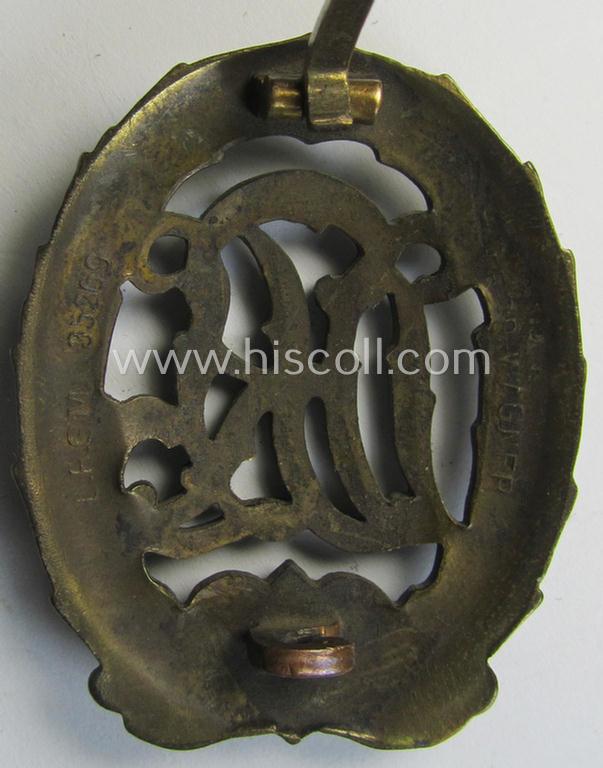 Attractive - and I deem just moderately worn- ie. used! - 'Reichssportabzeichen DRL in Bronze' (or: DRL sports'-badge in bronze) being an example that is nicely maker- (ie. 'Ferd. Wagner'-) marked on its back