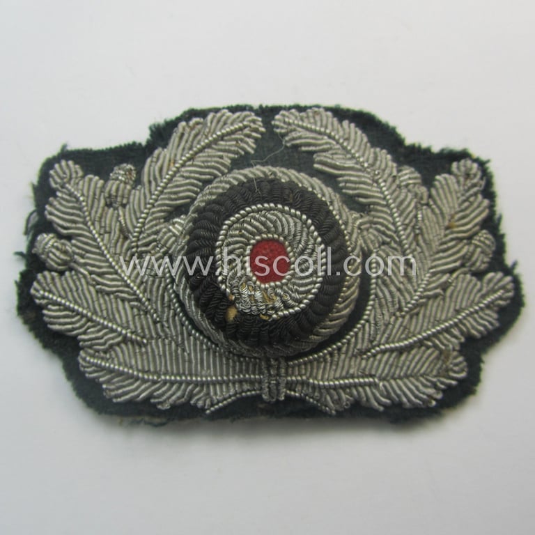 Clearly used- and/or cap-removed, WH (Heeres) officers'-pattern, visor-cap eagle/cocarde-set (ie. 'Effektensatz für Schirmmütze') being both hand-embroidered examples that come mounted onto a darker-green-coloured- and/or woolen-based background