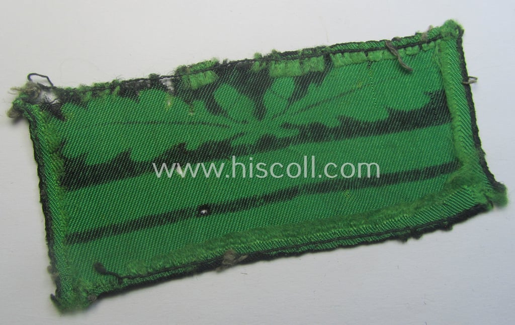 Attractive - clearly used albeit regrettably single! - officers'-pattern, WH (Heeres o. Waffen-SS) rank-insignia-bar (for usage on the camouflaged-uniforms) as used by an officer holding the rank of: 'Oberleutnant' (ie.: 'SS-Obersturmführer')