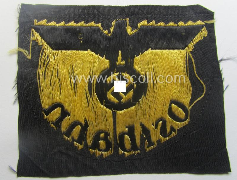 RB- ('Reichsbahn'-) related arm-eagle (ie. 'Ärmeladler') depicting the text: 'Ostbahn' (as was presumably intended for an official of the: 'Deutsche Reichsbahn' ie. the: 'WVD im Osten' ie.: 'Wehrmacht-Verkehrsdirektion im Osten')