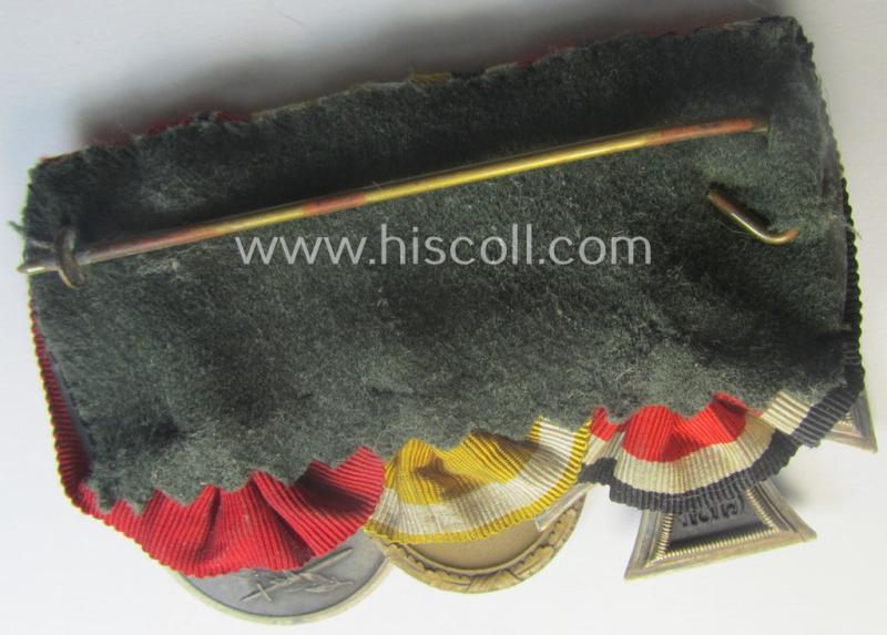 3-pieced, WWII-period medal-bar (ie. 'Ordenspange') showing resp. an: 'EKII.Kl.', a: 'Westwall'-medal and a: 'Medaille Winterschlacht im Osten 1941-42'