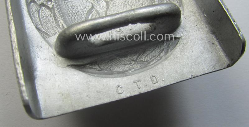 'Stonemint', WH (Luftwaffe) silver-coloured and/or molded aluminium-based belt-buckle, being a clearly maker- (ie. 'C.T.D.-) marked example