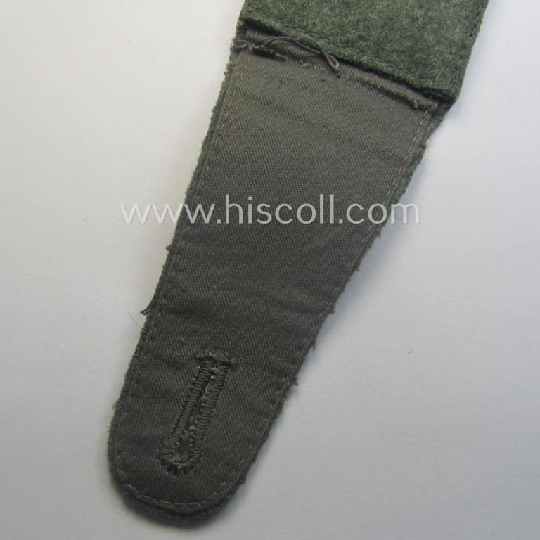 Single, WH (Kriegsmarine) 'cyphered' EM-type shoulderstrap: 'Soldat eines Küsten-Artillerie-Rgts. o. Abtlgs.'