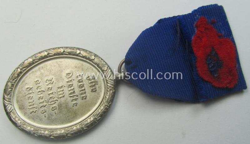 RAD (ie. 'Reichsarbeitsdienst') so-called: 'Dienstauszeichnung 3. Stufe für Männer' (as was intended for 12 years loyal-service) and that came mounted onto its period piece of ribbon (ie. 'Bandabschnitt')