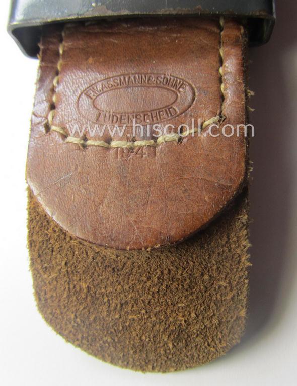 WH (Luftwaffe) blue-coloured- and/or steel-based belt-buckle, being a neatly maker- (ie. 'F.W. Assmann'-) marked and/or: '1941'-dated example that comes mounted onto its period, natural-coloured and/or leather-based tab