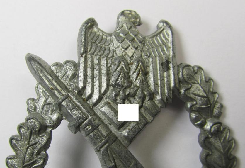 'Infanterie Sturmabzeichen in Silber', being an unmarked (and/or very converse- ie. vaulted-) 'hollow-back' example by the maker: 'Friedrich Linden' (ie. 'F.L.L.') as was executed in silver-coloured, zinc-based metal (ie. 'Feinzink')