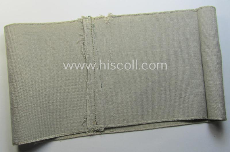 Superb - and rarely seen! - OT- (ie.: 'Organisation Todt'-) related, greyish-coloured and 'BeVo'-woven armband (ie. 'Ärmbinde') showing a detailed eagle-device and depicting the text: 'Org.Todt.' (and printed serial-number: '3859')