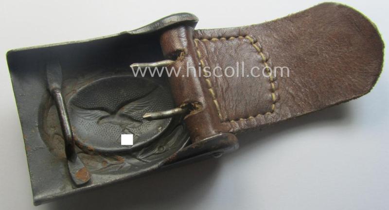 WH (Luftwaffe) blue-coloured- and/or steel-based belt-buckle, being a neatly maker- (ie. 'F.W. Assmann'-) marked and/or: '1941'-dated example that comes mounted onto its period, natural-coloured and/or leather-based tab