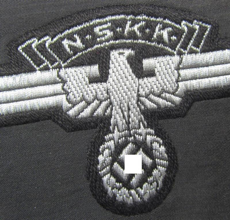 Attractive and typically 'BeVo flat-wire'-woven, so-called: N.S.K.K. (ie. 'National Socialistisches Kraftfahr Korps') arm-eagle being a very detailed- and/or 'virtually mint' example that still retains its period-attached 'RzM'-etiket