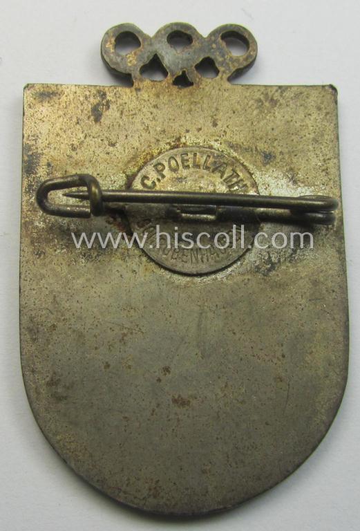 Commemorative 'Veranstaltungsabzeichen' (ie. 'tinnie') being a maker- (ie. 'Carl Poellath'-) marked example that is showing a sportsman on skis coupled with the text: 'Garmisch-Partenkirchen'