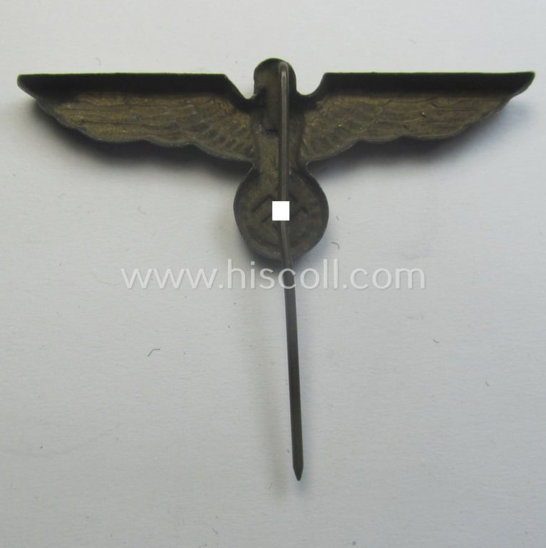 WH (Kriegsmarine) 'single-pattern'-eagle-pin being a (typical) non-maker-marked, zinc-based example as was intended for attachment to the (darker-blue- ie. white-topped-) so-called: 'Tellermützen'