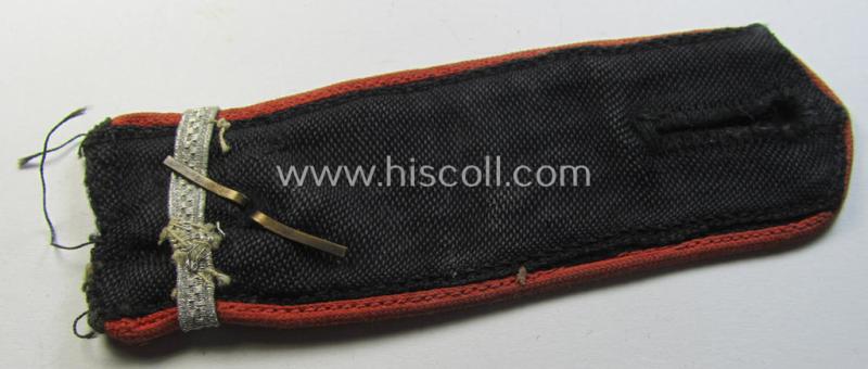 Single - and clearly worn - bright-red-piped so-called: 'Allgemeine-HJ'-shoulderstrap as intended for an: 'HJ-Oberkameradschaftsführer' who served within the 'Bann 287' (287 = 'Bann Offenbach' situated in the 'Gebiet West Hessen-Nassau')