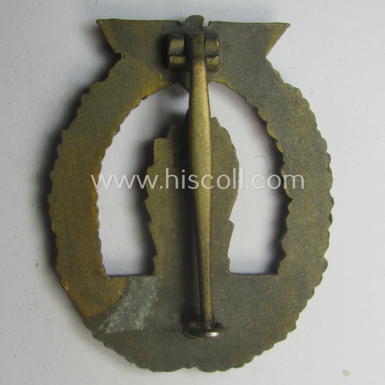 WH (Kriegsmarine) 'Kriegsabzeichen für Minensuch-, U-Boot-Jagd und Sicherungs-Verbände' being a detailed and clearly maker- (ie. 'R.K.') marked, 'Feinzink'-based example as was produced by the 'Rudolf Karneth'-company