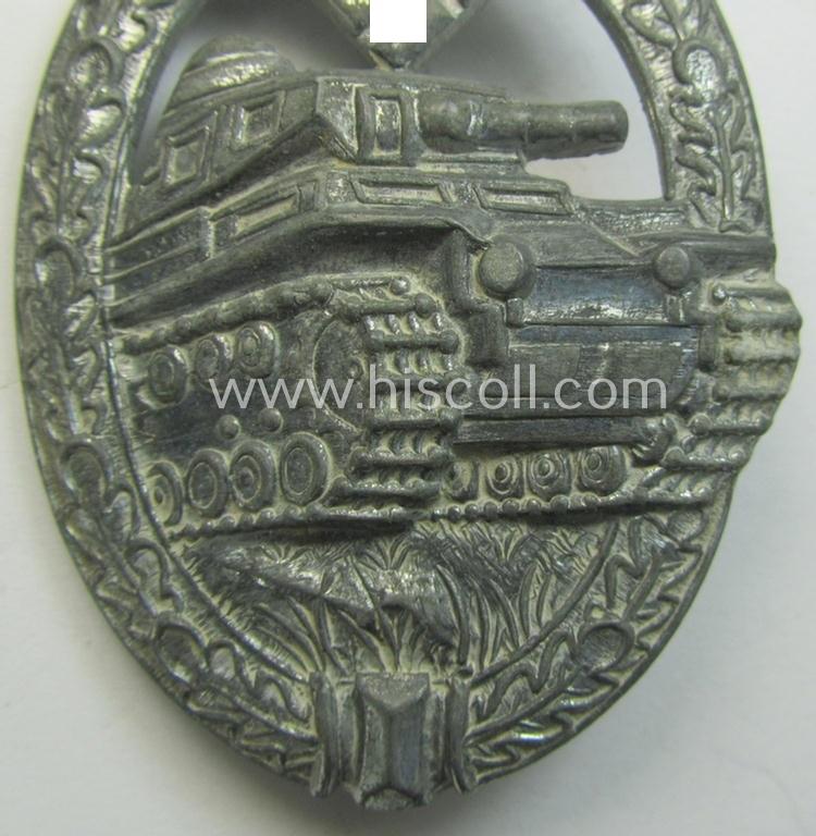'Panzerkampfabzeichen in Silber' (or: silver-class panzer-assault badge or PAB) being a clearly maker- (ie. 'AS' in a triangle-) marked- and/or typical zinc- (ie. 'Feinzink'-) based specimen as was procuced by a to date unknown maker