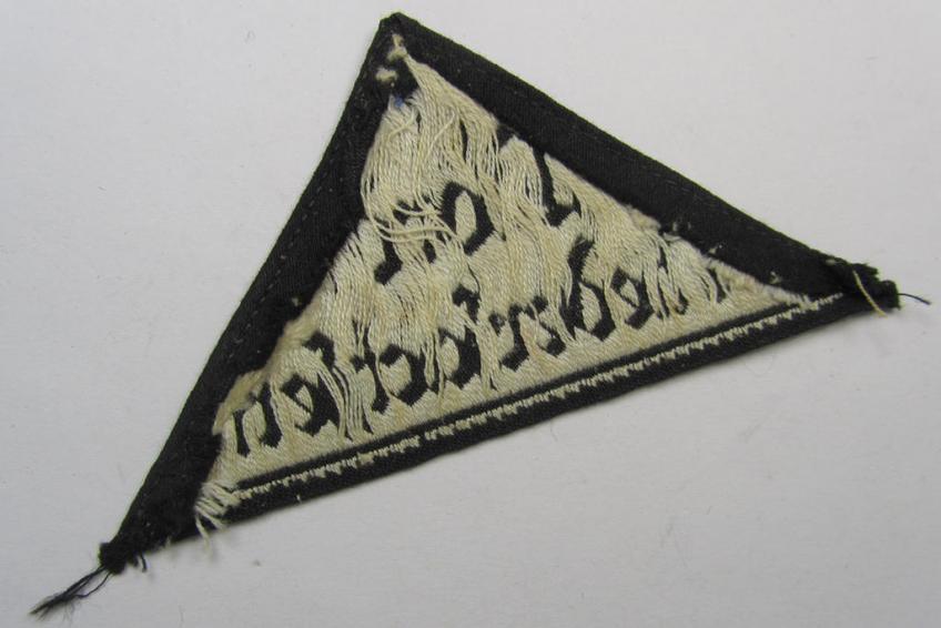 HJ/BDM ('Hitlerjugend' ie.: 'Bund Deutscher Mädel') district-triangle (ie. 'Gebietsdreieck') being an example that misses its 'RzM-etiket' and that is entitled: 'Nord Niedersachsen' and that comes in a tunic- ie. shirt-removed, condition