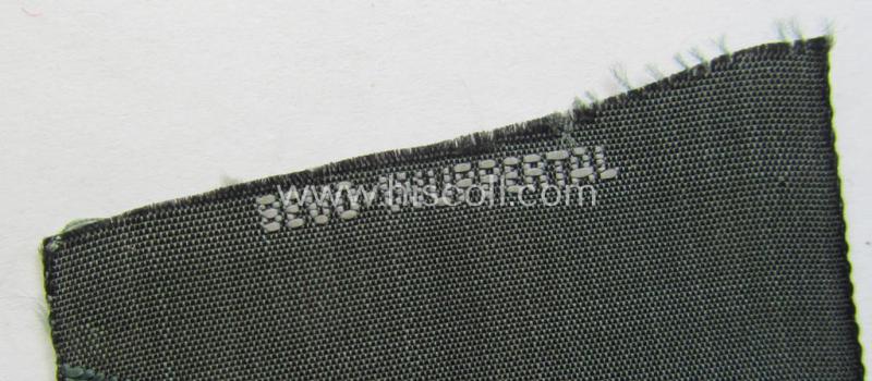 Superb, Waffen-SS field-grey-coloured, M43-pattern cap-trapezoid as was intended for usage on the M43-model field-caps (ie. 'Einheitsfeldmützen') being a 'BeVo-Wuppertal'-marked example that comes in a 'virtually mint- ie. unissued', condition