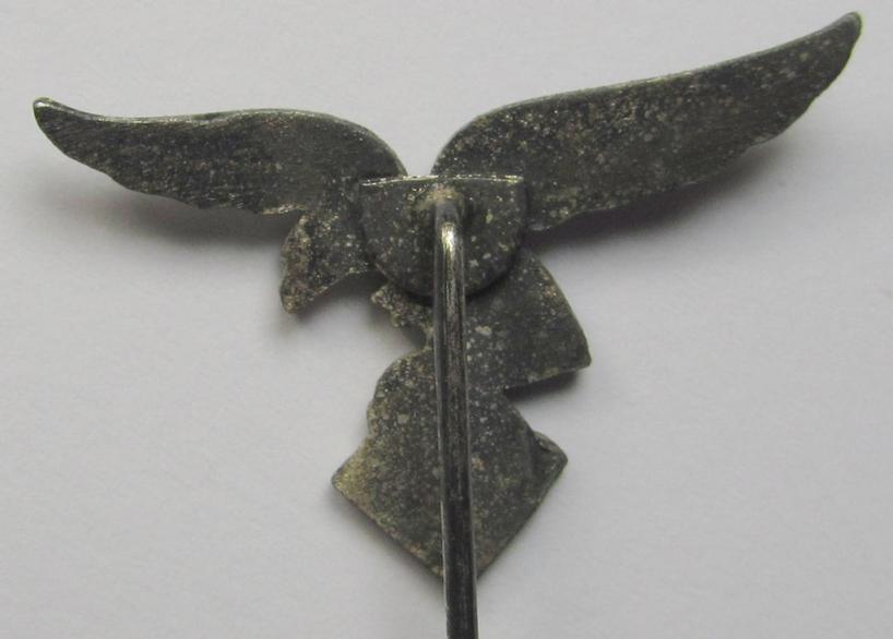 Bright-silver-toned lapel-pin (ie. 'Zivilabzeichen') to be worn on the civil attire as was intended for usage by the various staff-members of the 'Luftwaffe' (depicting an early-pattern- ie. 'down-tailed'-eagle)