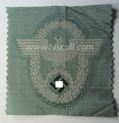 Police- (ie. 'Polizei'-) related armbadge (ie. arm-eagle) being...