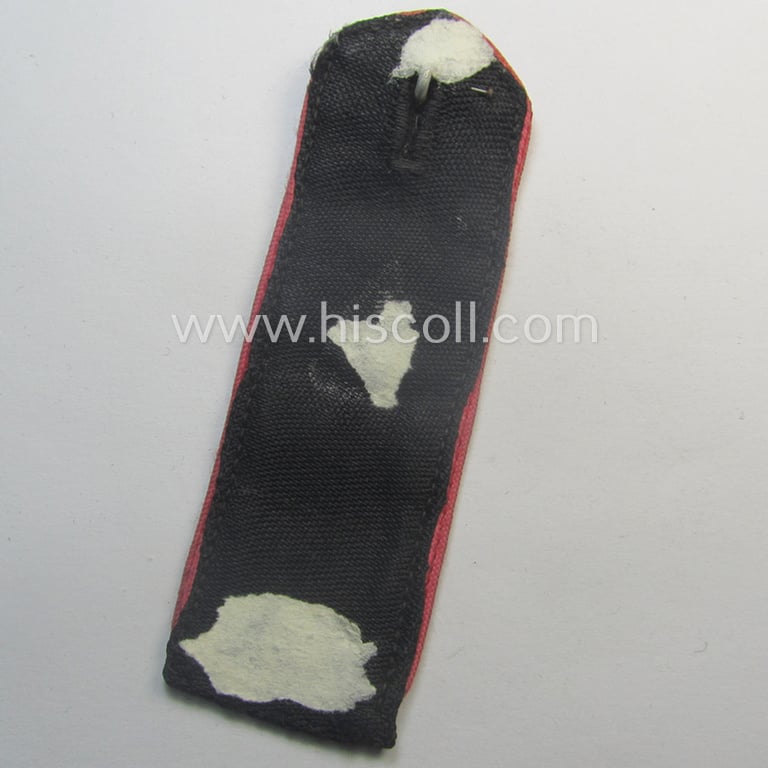 Single - and moderately worn - bright-pink-piped, so-called: 'Motor-HJ'-shoulderstrap as intended for a: 'Hitlejunge' who served within the 'Bann 250' (Bann 250 = 'Bann Goslar' situated in the 'Gebiet Nord Niedersachsen')
