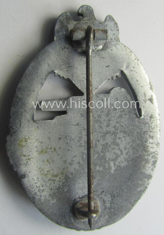 'Panzerkampfabzeichen in Silber' (or: silver-class panzer assault-badge or PAB) being a neat (I deem) somewhat later-war-period zinc- (ie. 'Feinzink'-) version as was procuced by the: 'Frank u. Reif'-company