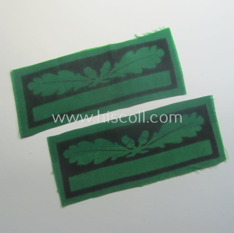 Pair of officers'-pattern, WH (Heeres o. Waffen-SS) rank-insignia-bars (for usage on the various camouflaged-uniforms) as was used by an officer holding the rank of: 'Leutnant' (ie.: 'SS Untersturmführer')