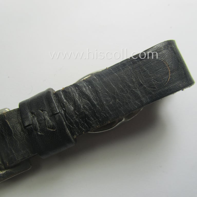 Black-coloured- and genuine leather-based, SS-related dagger-hanger (ie. 'Gehänge für den Dienstdolch M33 der Schutzstaffeln (o. SS)' being a very nicely preserved example that shows a stamped 'RzM'-designation