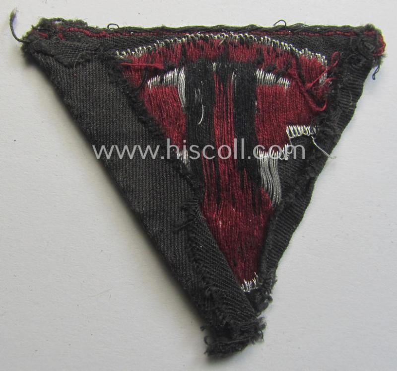 Attractive - and truly used! - so-called: N.S.K.K. (ie. 'National Socialistisches Kraftfahr Korps') side-cap-eagle (ie. 'Adler für Schiffchenmütze') being a 'flat-wire-woven'-example that comes mounted onto a wine-red-coloured background