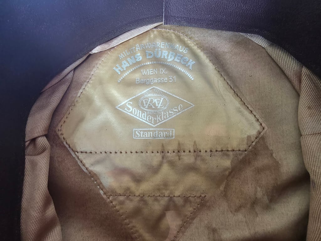 Original German officer's visor cap (Schirmmütze) Nachrichtentruppe
