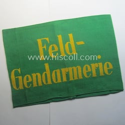 Wehrmacht-related, bright-green-coloured and/or linnen-based armband entitled: 'Feldgendarmerie' (as...