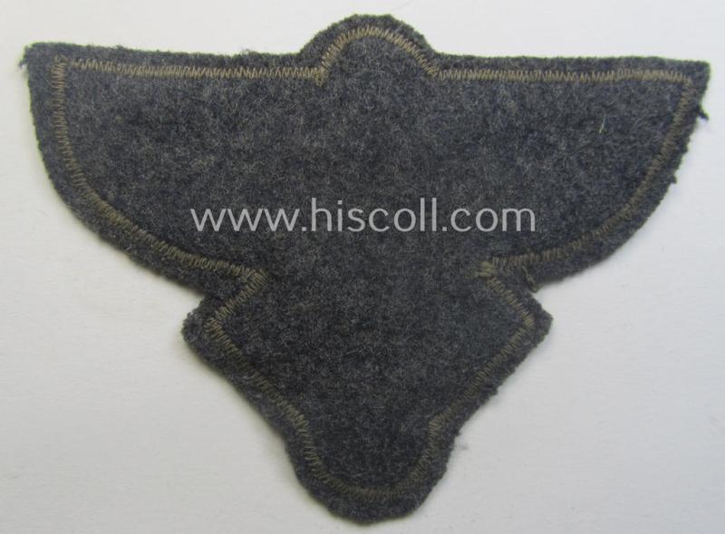 Bluish- (ie. silver-) coloured, so-called: N.S.F.K.- (or: 'National Socialistisches Flieger Korps') breast-eagle being a nicely woven- (and officers'-pattern) example that comes mounted on its piece of bluish-grey-coloured linnen