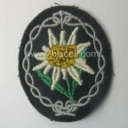 WH (Heeres) EM- (ie. NCO-) type: 'Edelweiss'-armpatch (being...
