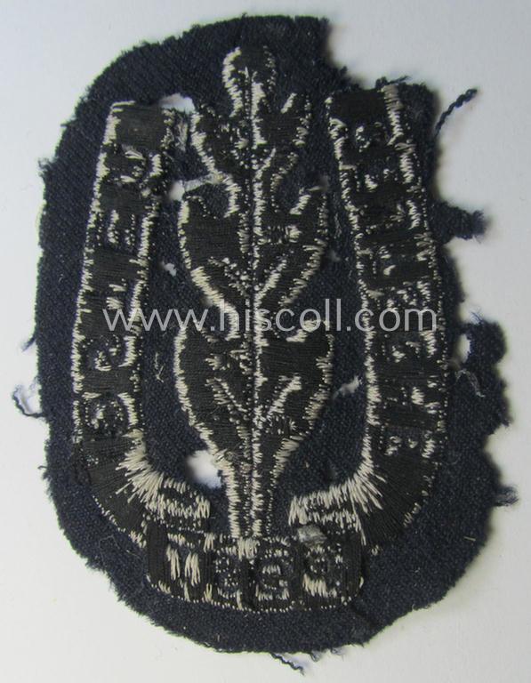 Unusual - truly used and actually scarcely seen! - example of a TR-period arm-insignia-piece as was specifically intended for usage by the various officials serving within: 'Deutsche Post Osten'-organisation