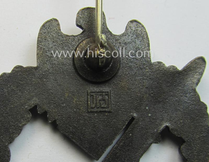 'Infanterie Sturmabzeichen in Bronze' being a maker- (ie. 'JFS'-) marked, 'solid-back' example by the desirable maker: 'Josef Feix u. Söhne' as was executed in golden-bronze-coloured, zinc-based metal
